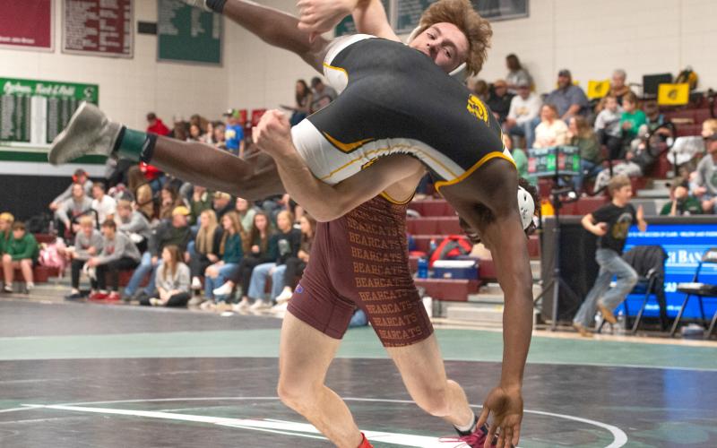 Webster Area wrestler Haeden Jorgenson picks up his opponent during the Clark/ Willow Lake WBC Invitational Dec. 6 in Clark. Jorgenson finished first in the 150 weight class with a record of 3-0. Reporter &amp;amp; Farmer | Brianna Jorgenson, Captured Creations Photography