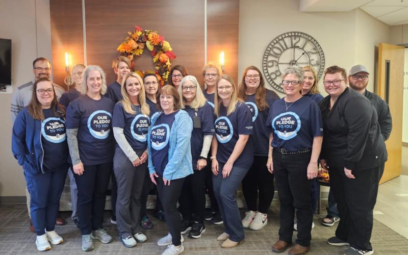 Sanford Webster Medical Center employees are, from front left, Kim Kaufman, Dr. Elizabeth Gravley, Lori Reetz, Sue Hoven, Melanie Opitz, Ashley Ewing, Sheryl Grout and Molly Ramsey. Back row, from left, is Brad Olson, Amanda Paszek, Casey Zochert Huffman, Denise Below, Sarah Vergeldt, Missy Bartelt, Kasey Decker, Nicole Johnson and Bryce Sichmeller.