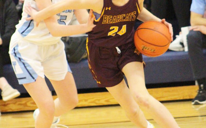 Webster Area Bearcats girls basketball squared off against Leola/Frederick Area Titans on the road Feb. 15. Bearcats prevailed in the contest with a final score of 5625. Here, Cartney Hanson (24) escapes pressure from Titans defender Eden Podoll (15). Reporter &amp;amp; Farmer | Subscriber Snapshot