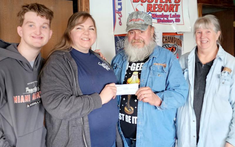 Buster’s Resort, rural Webster donated fundraising proceeds of $1,369 to Pierpont Fire Department. Pictured, from left, are fire department representatives Cameron Feist and Stacey Knutson accepting the donation from Buster and Peggy Sichmeller. Reporter &amp;amp; Farmer | Subscriber snapshot
