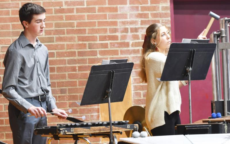 Webster Area High School and Middle School band performed Dec. 5 at the Webster Armory for the annual winter concert. Here, from left seventh and eighth grade band members Ace Lesnar and Remi Hubsch play their instruments in front of a large crowd. Reporter &amp;amp; Farmer | Brenner Cariveau