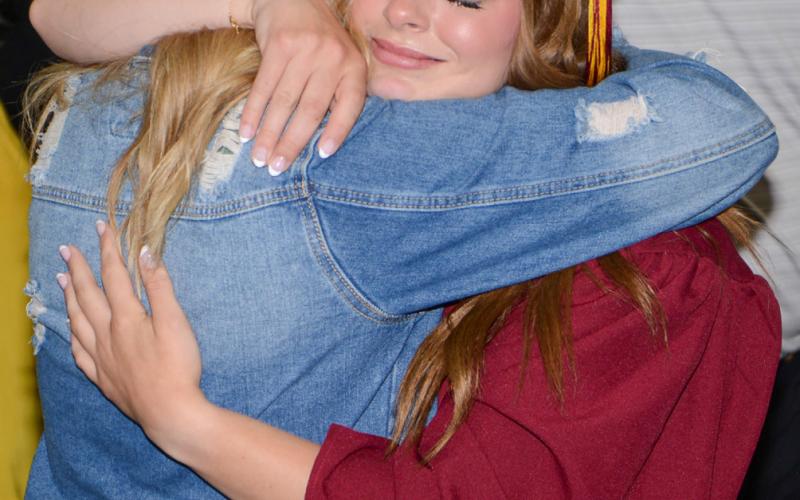 Webster Area High School graduate Charlotte Grewe shares an emotional moment with her mom Melissa Grewe May 19 during graduation proceedings at the Webster Armory where 32 graduates crossed the stage to receive their diplomas. Reporter &amp;amp; Farmer | Amanda Dulitz