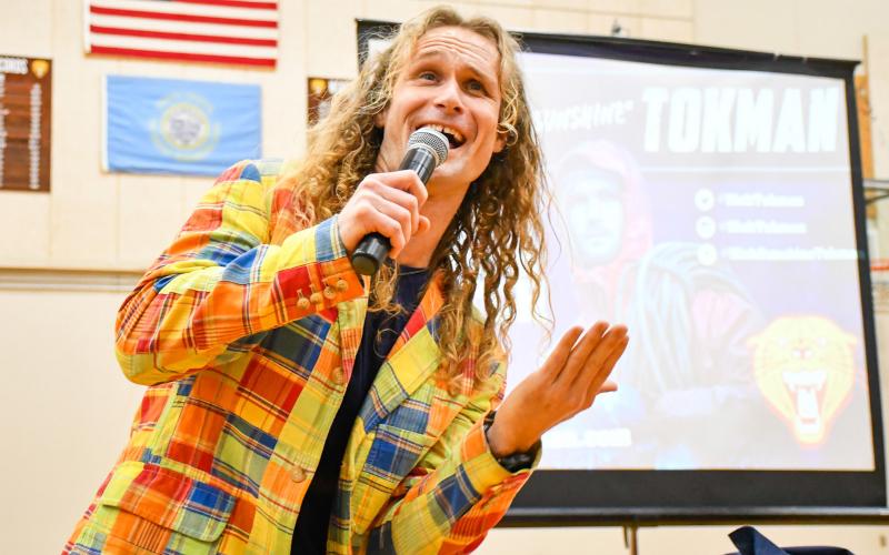 Motivational speaker Nick “Sunshine” Tokman sings during an assembly for Webster Area Middle and High School students Jan. 13 in the Webster Area High School gym. Tokman used his life experience as a professional fisherman on the Deadliest Catch TV show to discuss topics such as depression, low self-worth, discovering a career path and believing in yourself. Reporter &amp;amp; Farmer | Leyton Beardslee