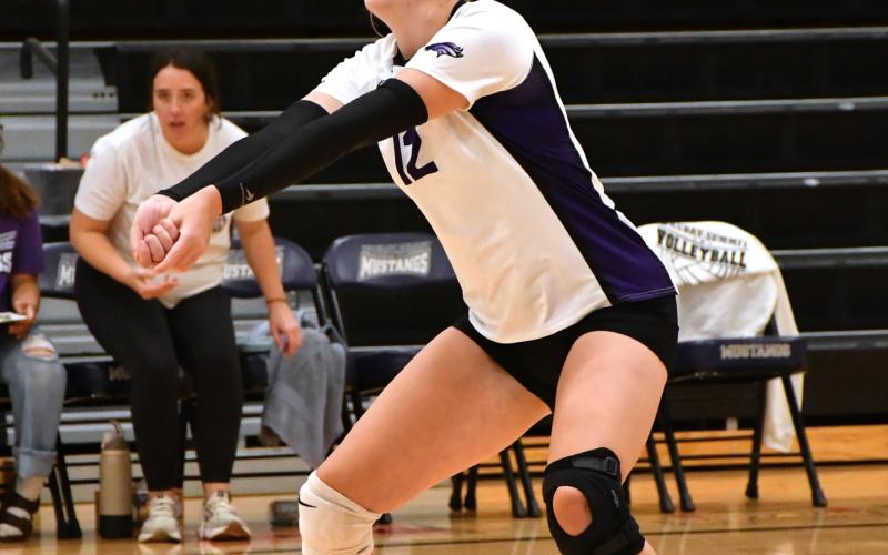 Mackenzie Zubke receives the ball during Waubay/Summit’s 2-3 match loss against Milbank Sept. 16 in Summit. Set scores for the match were 23-25, 25-15, 25-13, 25-27 and 5-15. Reporter &amp;amp; Farmer | Leyton Beardslee