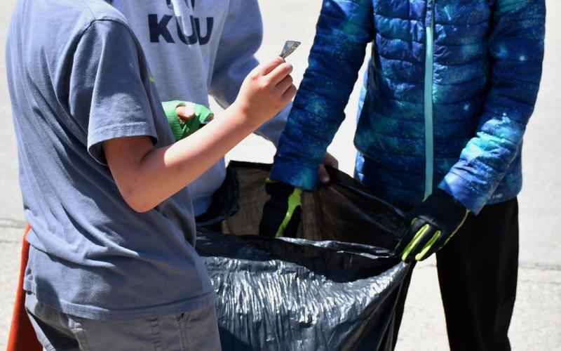 In honor of Earth Day, Webster Area Elementary students hit the streets of Webster to clean up any trash they found. Here third graders Odin Brockhaus, Hunter Ruff and Beckett Matthews assist in the endeavor April 23. Reporter &amp;amp; Farmer | Leyton Beardslee