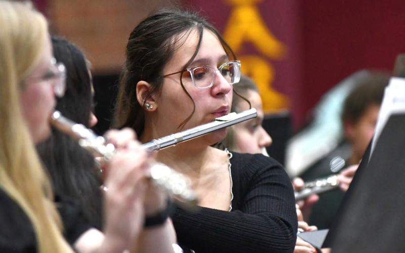 Webster Area High School junior Elizabeth LaDue takes part in the school’s winter concert held Dec. 6 at the Webster Armory. Reporter &amp;amp; Farmer | Leyton Beardslee