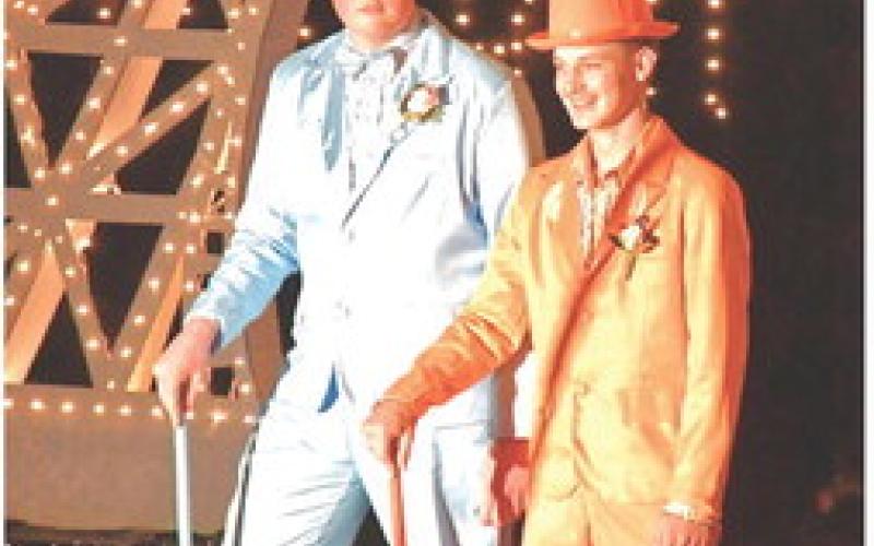 Waubay School held their prom April 10 and students were very excited to show off their hard work put into the celebration. From left, Derek Karst and Linken Niles participate in the Grand March by showing off their dapper and luxurious suits. See more on 14. Reporter &amp;amp; Farmer | Connor Handrahan