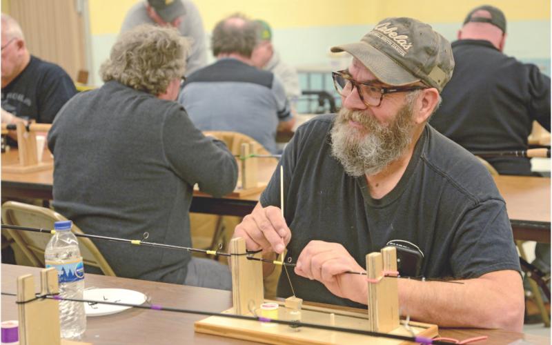 Veterans spend day building fishing poles