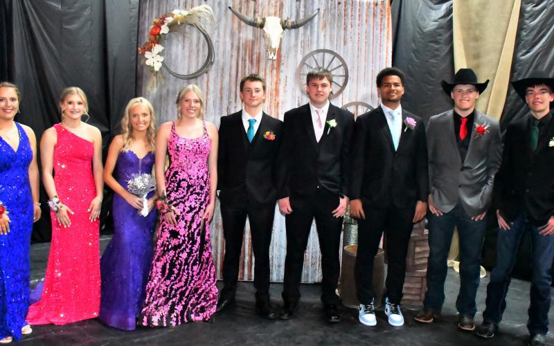 Waubay student council members Sage Gaikowski ninth grade, Kayce Berger 11th grade, Megan Christensen 12th grade, Caley Boik 10th grade, Witten Butler 10th grade, Nolan Thuringer 12th grade, Traveion Neilan 12th grade, Tripp Gaikowski 11th grade and Teegan Gaikowski 11th grade, pose for a picture at Waubay High School’s prom April 25. Reporter &amp;amp; Farmer | Leyton Beardslee