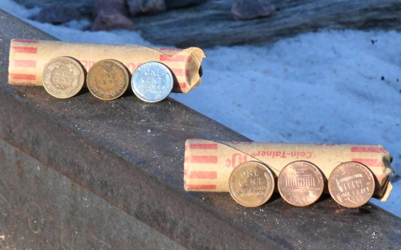 Penny production was discontinued Nov. 12 and it has held many different designs throughout the years. From top left, a flying eagle cent, Indian head, steel cent, Lincoln wheat penny, Lincoln Memorial penny, Lincoln union shield penny, displayed on the railroad tracks in Webster. Reporter &amp;amp; Farmer | Leyton Beardslee