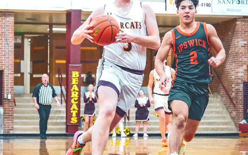 Sheldon Schmieg (5) of Webster Area looks to score a break-away layup during the Bearcats 62-65 loss to Ipswich Tigers Dec. 20 in Webster. Schmieg aided the Bearcats effort making two of his three attempts from beyond the arc. Reporter &amp;amp; Farmer | Leyton Beardslee