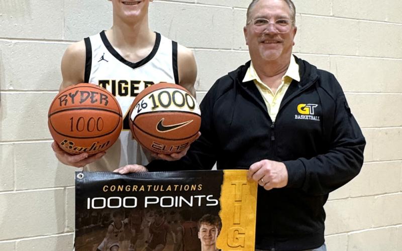 Groton Area senior Ryder Johnson, pictured Jan. 15 with head coach Greg Kjellsen after scoring his 1,000th career varsity point, now has his eyes set on leading the Tigers to a state tournament appearence in his final season. Johnson scored his 1,000th point in an 83-9 victory over Tiospa Zina in a 15 point performance. Reporter &amp;amp; Farmer | Subscriber snapshot