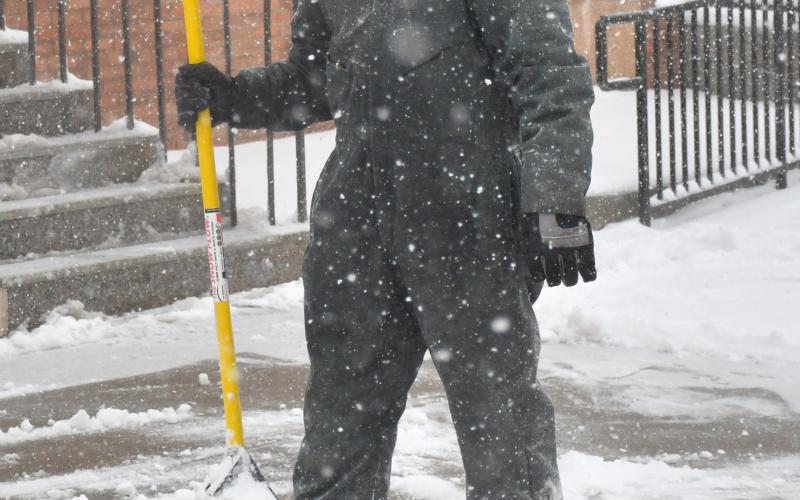 Mathew Barrett of Webster shovels snow outside Webster Post Office Nov. 25. Reporter &amp;amp; Farmer | Leyton Beardslee