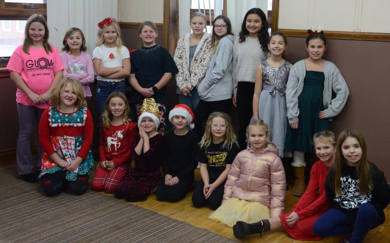 Girl Scout Christmas carolers