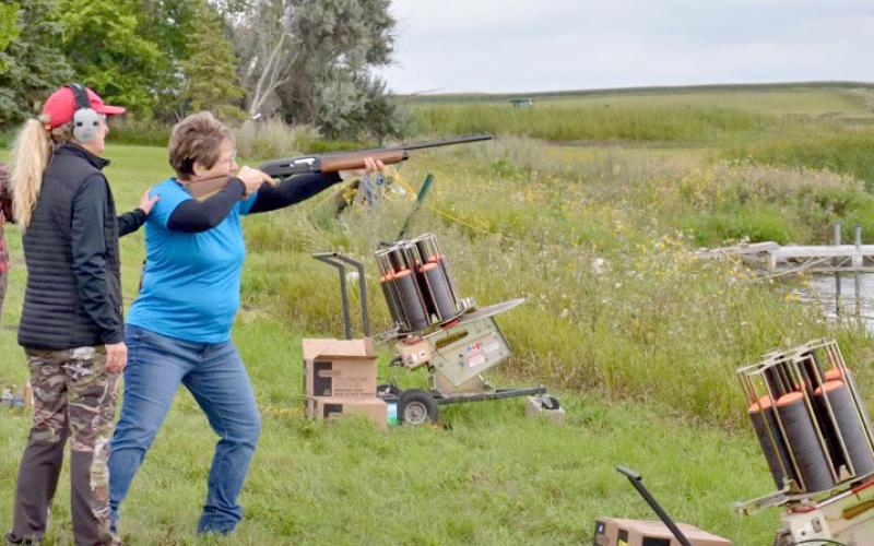 Tina Dokken steadies Shannon Garduno’s shoulder during a target practice session at last year’s event to learn how to pheasant hunt at Lynn Lake. Reporter &amp;amp; Farmer | Subscriber snapshot
