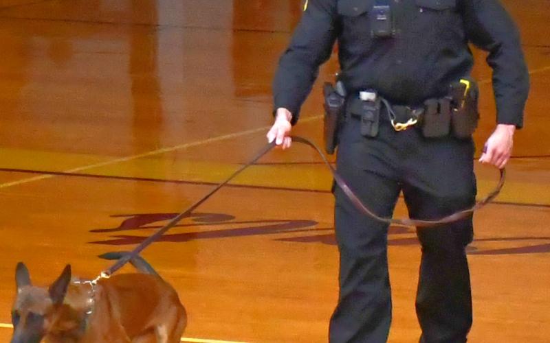 Brandon Miller a United States Marine Corps veteran gave a speech at Webster Area’s Veterans Day assembly at Webster Armory Nov. 11 joined by his South Dakota Highway Patrol K-9 dog named Lucky. Miller addressed students and community members about the importance of honoring veterans. Reporter &amp;amp; Farmer | Connor Handrahan