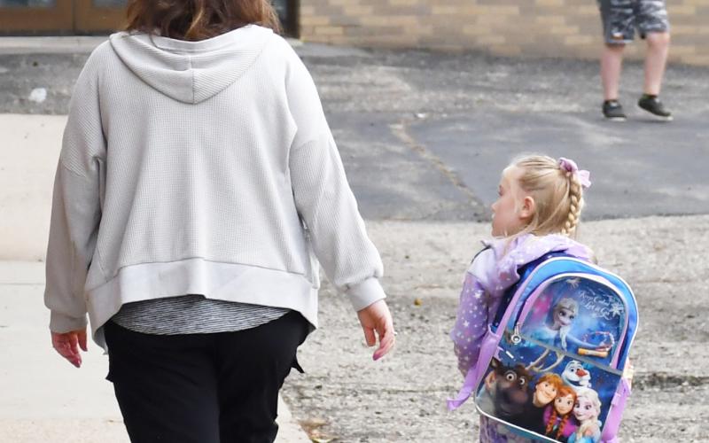 The first day of school for Webster Area School District started Aug. 20. Five-year-old Berkley Matthews walks to her first day of kindergarten at Webster Area Elementary School alongside her mother, Brandi Matthews. Reporter &amp;amp; Farmer | Brenner Cariveau