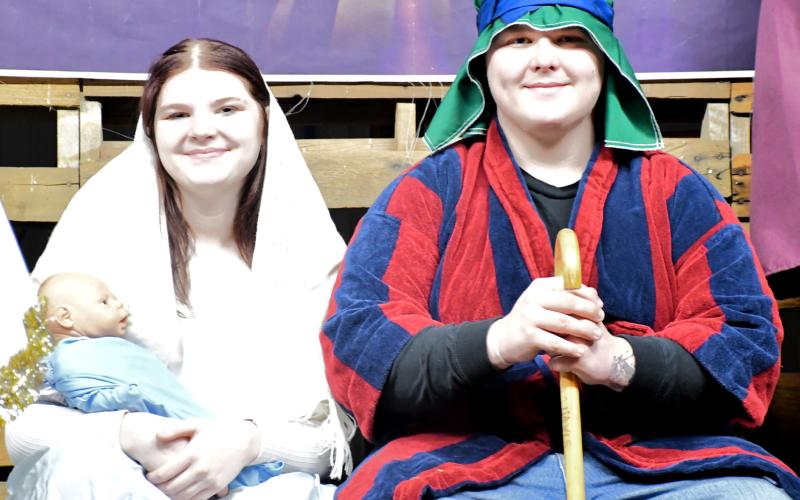 Bergen Church put on a live reenactment of the holy night Dec. 21. Left, LJ Mays portrays Mary and Sean Sichmeller portrays Joseph and were visited by angels, sheperds and wise men. See more, page 2. Reporter &amp;amp; Farmer | Connor Handrahan