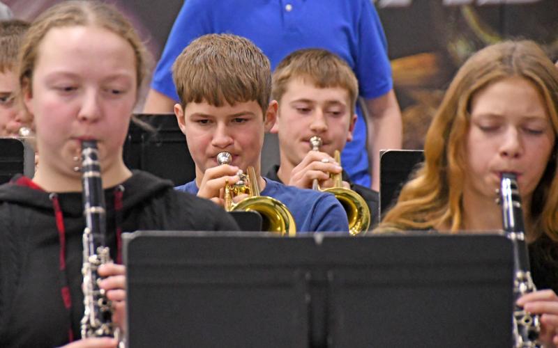 McKenzie Zubke, Blake Dolen, Witten Butler and Riley Pies perform in concert during Waubay High School Christmas concert Dec. 9. Reporter &amp;amp; Farmer | Amanda Dulitz