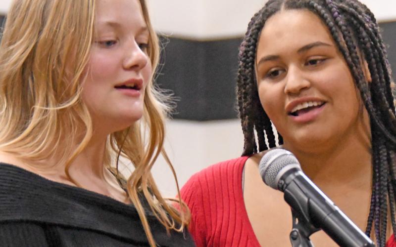 Gracia Althoff and Casharie Neilan performed signature parts of a song during the Waubay High School Christmas concert Dec. 9. Reporter &amp;amp; Farmer | Amanda Dulitz