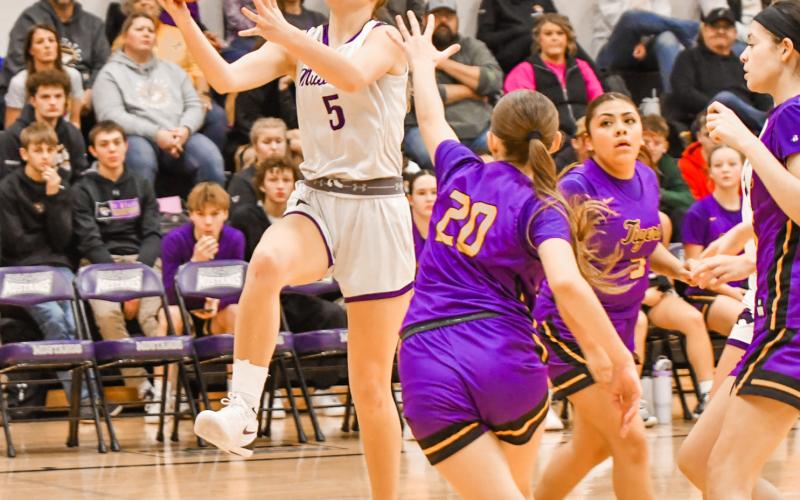 Liza Purdy of Waubay/Summit attempts a layup during the Mustangs 60-21 win over Tri-State Tigers Dec. 30 in Summit. Purdy finished with 12 points in the game. Reporter &amp;amp; Farmer | Leyton Beardslee
