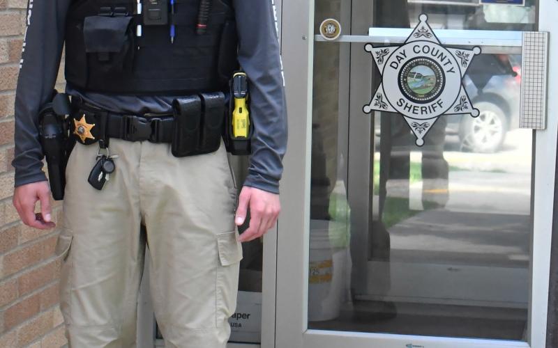 Sheriff Deputy Kolby Weinberg stands in front of the Day County Sheriff’s Office. Weinberg graduated from Lake Area Technical College with an associate degree in law enforcement. Reporter &amp; Farmer | Annie Witt