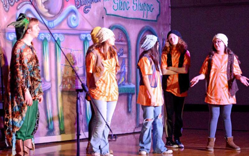 Webster Area Schools played host to the Dakota Players March 14. They put on a musical production – which student-actors had only a week to practice – depicting a spin on the classic “Emperor’s New Clothes” story. Pictured from left are Dakota Player director Grant Meyers, Webster Area students Ashley Rumpca (behind), Hannah Crawford, Dawn Heer, Kalli Holman and Lyric Cyrus. Reporter &amp;amp; Farmer | Amanda Dulitz