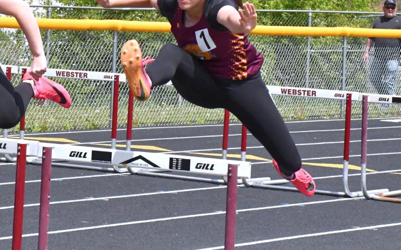 Emily Acree races in the 100m hurdles at the Webster Invitational May 21. Acree placed third with a time of 19.55. Reporter &amp;amp; Farmer | Connor Handrahan