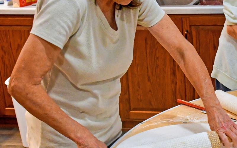 Terry Hagen rolls out lefse dough Nov. 21 during lefse fundraiser at Tabor Church, Webster. The dough must be thin enough so it can evenly cook on both sides, but sturdy enough to not fall apart. Reporter &amp;amp; Farmer | Connor Handrahan