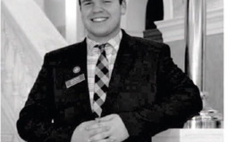 Gage Miotke poses on the stairwell inside the state capitol building in Pierre during his tenure as a senate legislative page during the 2025 session.