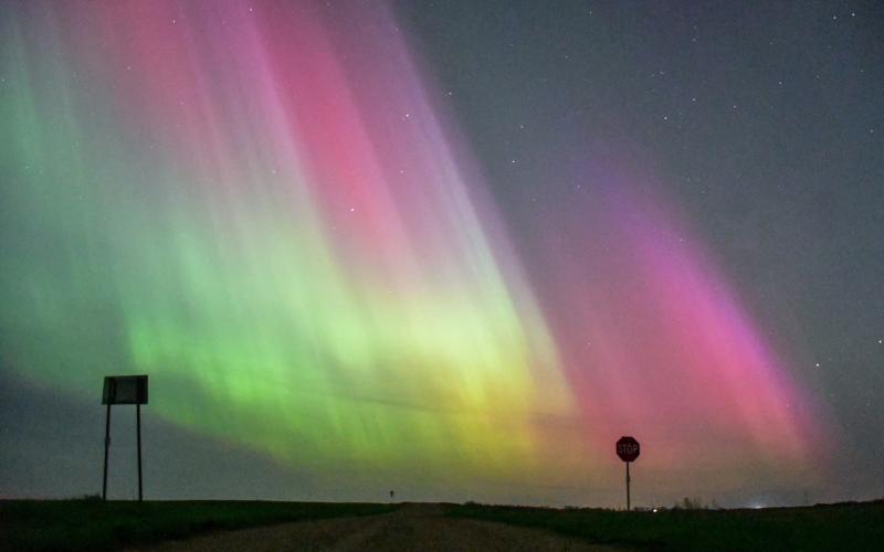 This image of the aurora borealis, usually seen to the north, was taken facing due west on a rural county road south of Webster in the early morning hours of May 11. This particular show of lights was caused by a solar storm flare that hit earth, one of the largest in nearly 20 years with a KP level of 8+. While the camera lens exaggerates the color profile of the lights, some of the colors could be seen with the naked eye. Reporter &amp;amp; Farmer | Amanda Dulitz