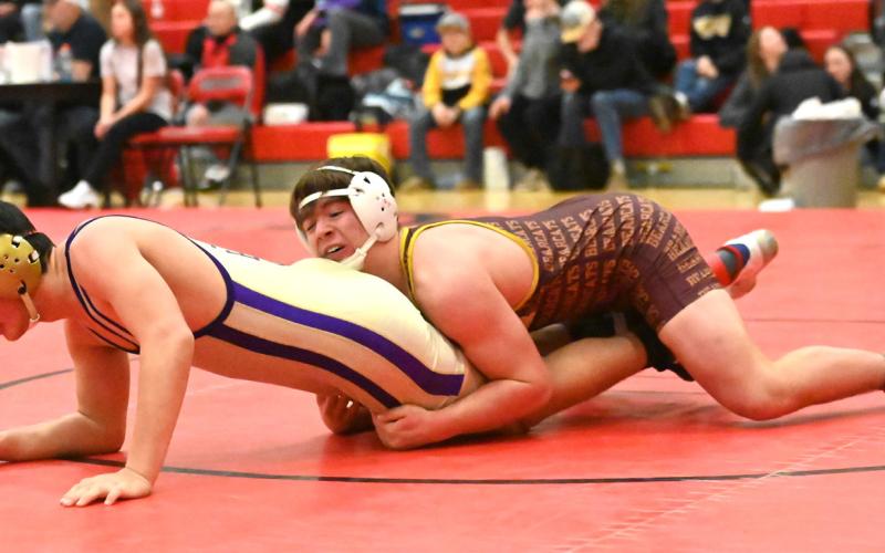Nathan Hubsch of Webster Area Bearcats attempts to pin his opponent during their match in the Battler Wrestling Invitational Jan. 17 in Gettysburg. Hubsch placed fifth with a record of 4-2 and scored 17 team points. Reporter &amp;amp; Farmer | Brianna Jorgenson, Captured Creations Photography