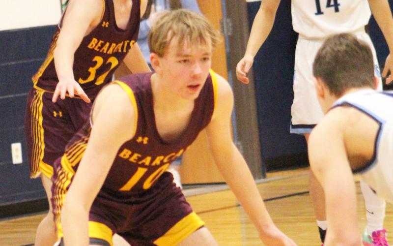 Bearcats traveled to face Leola/Frederick Area Titans Feb. 15 which ended in a 42-70 Webster Area loss. Here, Sheldon Schmieg (10) watches a Titan player closely while his teammate Gage Wik (32) guards Lucas Gulbranson (14) near the paint. Reporter &amp;amp; Farmer | Subscriber Snapshot