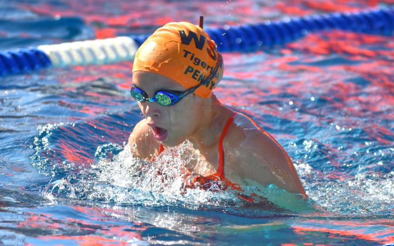 Penny Rencountre age 11 of Webster Swim Team competes in the mixed 12 and under 100 yard individual medley during the Webster Fun Meet at the Webster Aquatic Center July 8. Reporter &amp;amp; Farmer | Leyton Beardslee