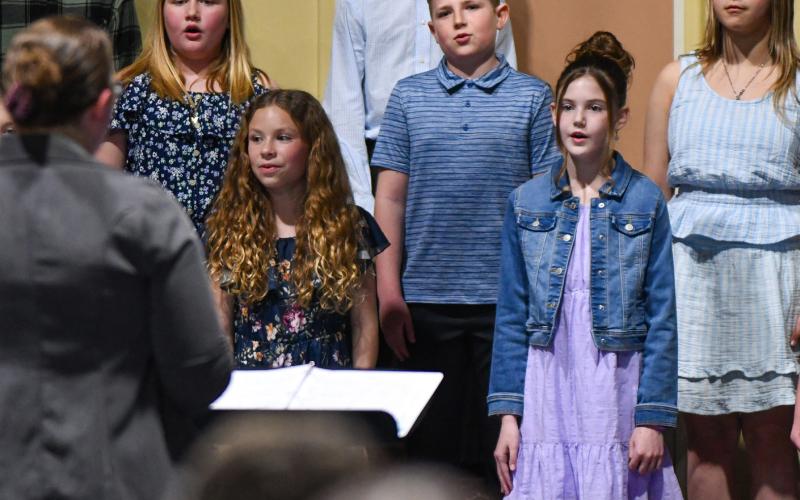 Webster Area Elementary students put on a spring concert April 18 with the theme “To the Stars.” Pictured from left in back are Karley Lone, Bryson Bloom and Journee Meier; in front are Embry Duenwald and Brynlee Christensen. Reporter &amp;amp; Farmer | Amanda Dulitz