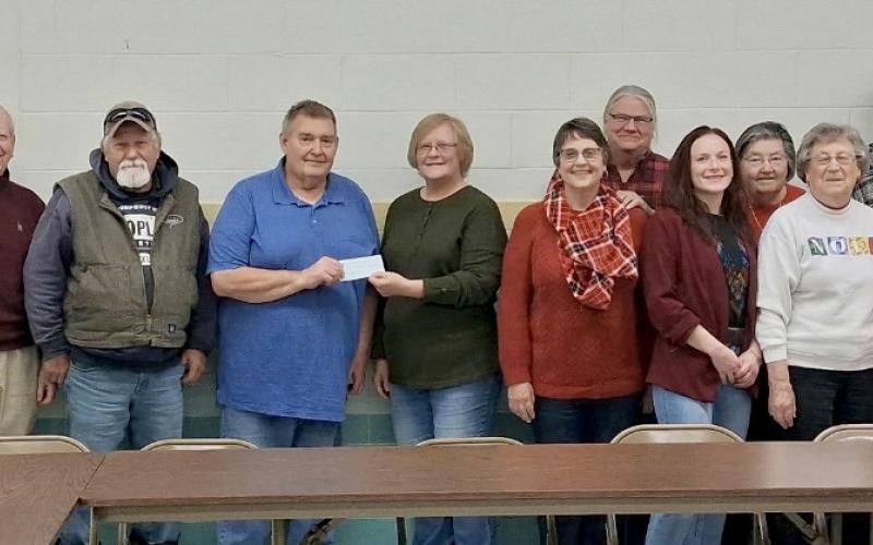 Day County Democrats donated $375.00 to Day County Food Pantry. Present were, from left, Gary Monson, David Sigdestad, Gene Gaikowski, Bob Bullert, food pantry director Margaret Kwasniewski, Becky Heimerl, Kim Heimerl, Courtney Enfield, Linda Roth, Alice Bartell, Carl Pulvermacher, Carol Richardt and Loren Johnson. Reporter &amp;amp; Farmer | Subscriber snapshot