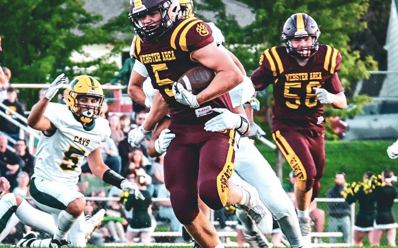 Webster Area running back Gage Baumgarn shrugs off a tackle during the Bearcat’s 32-26 win over Aberdeen Roncalli Sept. 26 in Webster. Baumgarn finished with 31 carries for 203 yards and two touchdowns. Reporter &amp;amp; Farmer | Leyton Beardslee