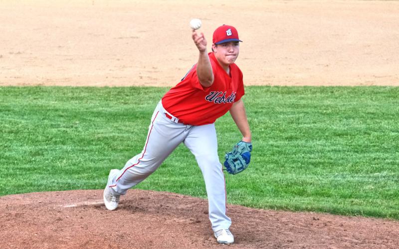 Tucker Acree hurls a pitch during the third inning of the Webster VFW Post 4690 Teeners first game against Milbank June 10 at Bob Wiley Field in Webster. Acree pitched three and two-thirds innings giving up five hits, one run and six walks while striking out two in the Teeners 1-9 loss. Reporter &amp;amp; Farmer | Leyton Beardslee