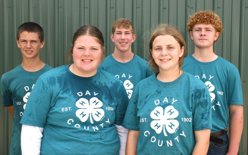 Small animal round robin participants at the Day County Fair Aug. 9 were, from left, Knute Hemmingson, grand champion Kelsey Fischer, Gabriel Gaikowski, Makayla Meland and Delaney Atherton. The 4-Hers took turns showing at five different stations, each centering on showcasing the youths’ skills in handling different spieces. Reporter &amp;amp; Farmer | Amanda Dulitz