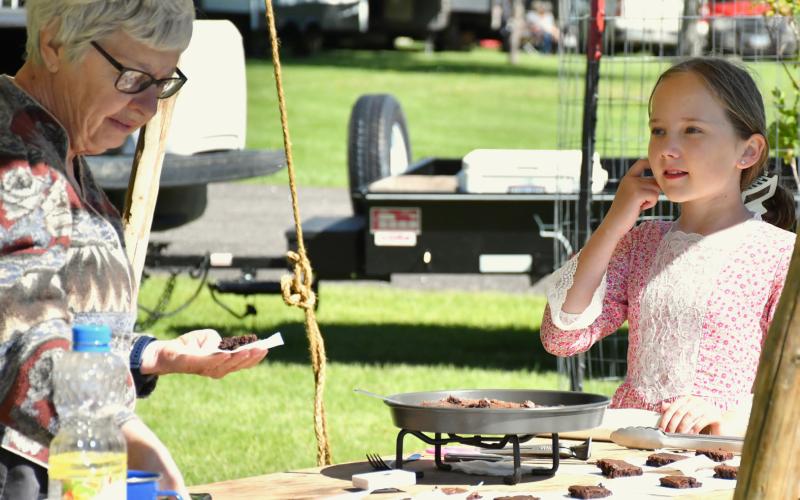 Reenactors Kendall Johnson and Jill Johnson prepare brownies for patrons at Fort Sisseton Historical Festival June 1 at Fort Sisseton State Park. Reporter &amp;amp; Farmer | Luke Caputo