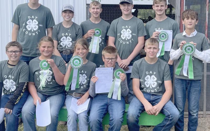 Participants in the Day County Fair 4-H poultry show are from left, front, Parker Zirbel, Aliyah Zirbel, Kallie Zirbel, Collin Zirbel, Aiden Gaikowski; back, Blaise McGregor, Macee McGregor, Gabriel Gaikowski, Caleb Gaikowski, overall grand champion Trey Dunse and overall reserve champion James Schulz. Reporter &amp;amp; Farmer | Subscriber snapshot