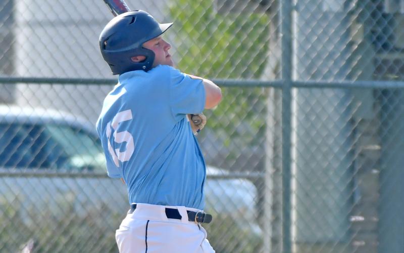 Webster American Legion Post 40 player Matthew Mount follows through after making a hit during a game against Clark/Willow Lake June 8 in Webster. The home team lost, 8-14 and 1-13. No stats were provided for this game. Reporter &amp;amp; Farmer | Annie Witt