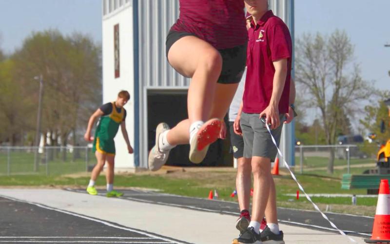 Webster Area 11th grader Sarah Zubke goes airborne during the Valley Queen Cheese Invite at Milbank May 6. Reporter &amp;amp; Farmer | Subscriber Snapshot
