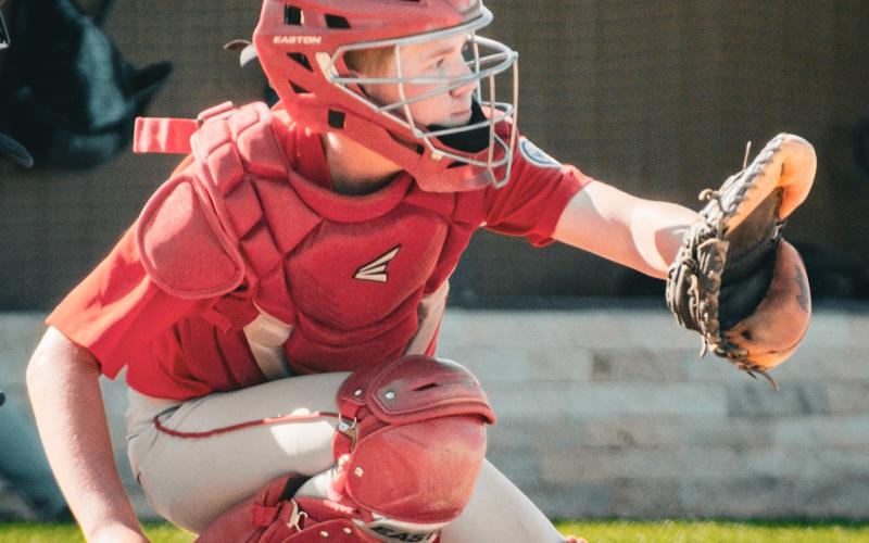 Catcher Dylan Rasmus waits for a pitch during the Teeners 6-5 win over Claremont June 23 in Webster. The game ended with a walk off single by Jase Schmidt in the bottom of the fifth inning. Reporter &amp;amp; Farmer | Leyton Beardslee