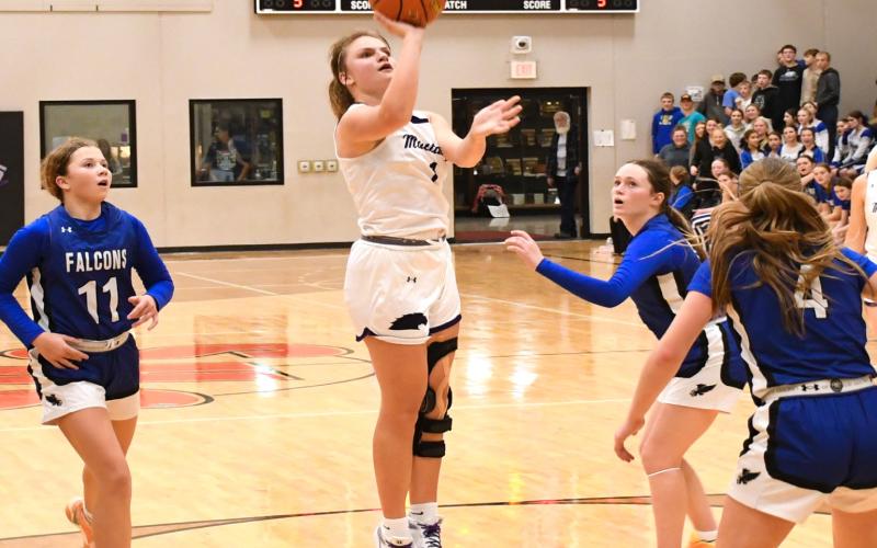 Peyton Rumpza (1) of Waubay/Summit puts up a shot during the Mustang’s 52-47 victory over Florence/Henry Falcons Dec. 15 in Summit. With the victory Waubay/ Summit moved to a record of 2-0 to start the season. Reporter &amp;amp; Farmer | Robert Dulitz