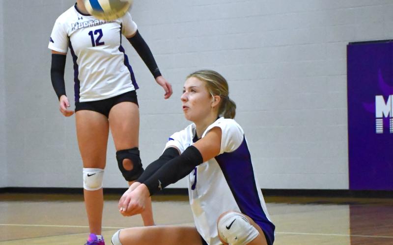 Liza Purdy (7) of Waubay/Summit receives a serve during the Mustang’s 0-3 match loss to Northwestern Area in Waubay Sept. 25. Set scores for the match were 13-25, 8-25 and 15-25. Reporter &amp;amp; Farmer | Leyton Beardslee