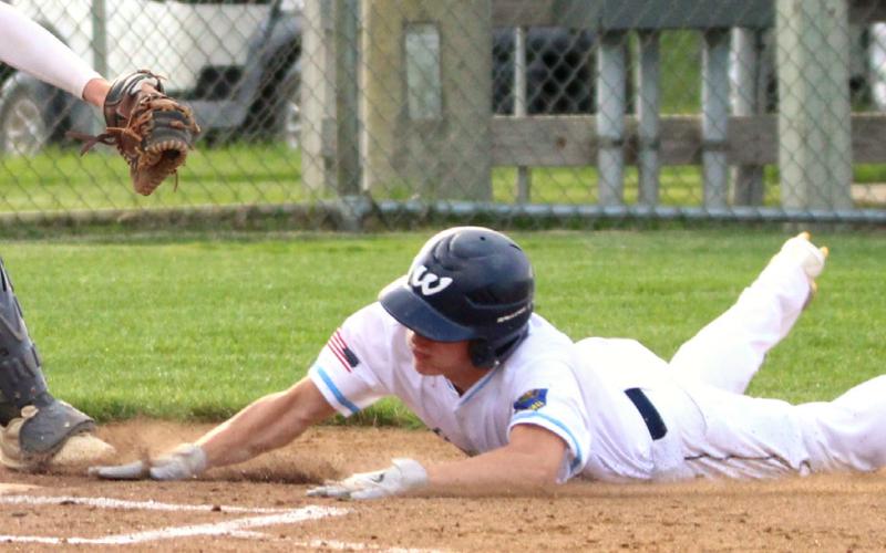 Martin Dorsett of Webster Legion Post 40 slides home to score the winning run in the bottom of the fifth inning of Webster’s 2-1 win over Sisseton June 30. Dorsett led off the inning with a single and was batted in by Blaize Amdahl. Reporter &amp;amp; Farmer | subscriber snapshot