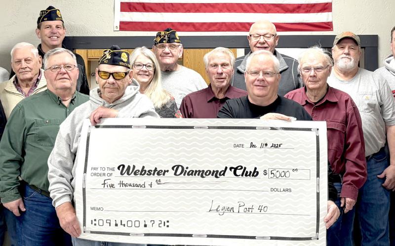 Webster American Legion donated funds to Webster Diamond Club. Pictured from left, holding the check are Randy Gaikowski and Mike Wiley; second row, Jeff Nelson, Paul Peterson, Paul Tvinnereim, Kris Tvinnereim, Dennis Kurkowski, Wayne Klungseth, Chuck Johnson, Zach Witte; back, Dennis DeWitte, Allan Weismantel, Tom Sannes, Tom Lewno, Rich Lesnar, Bob Page and Chad Hesla. Reporter &amp;amp; Farmer | Subscriber snapshot