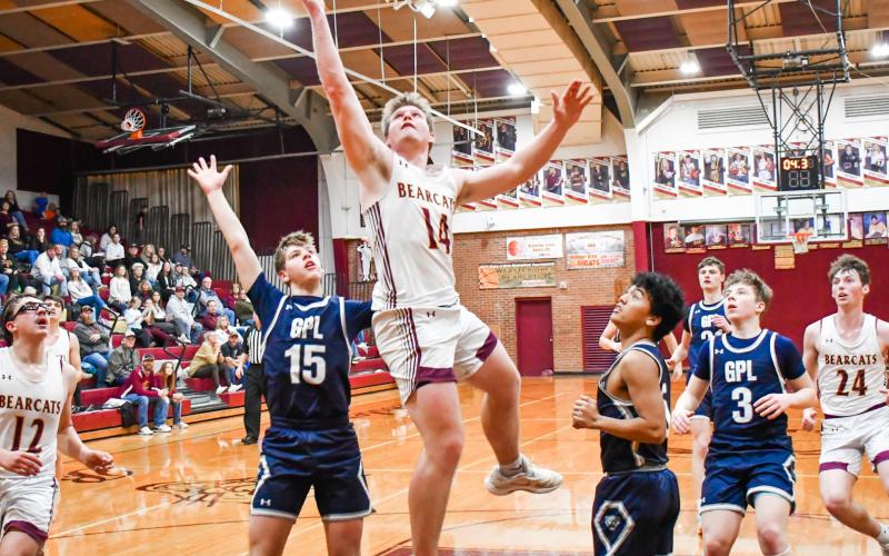 Matthew Mount (14) of Webster Area drives to the basket during the Bearcats 57-38 victory over Great Plains Lutheran Panthers Feb. 3 in Webster. The win brought Webster to a 6-6 record on the season. Reporter &amp;amp; Farmer | Connor Handrahan
