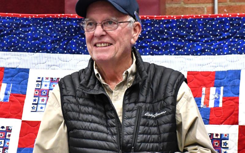 Donald Lewandowski receives his Quilt of Valor during the annual veterans banquet at Webster Armory Nov. 8. Lewandowski served as a Sergeant in the United States Army from 1965-67 and his awards include Vietnam Service Medal with Bronze Star device, Vietnam Campaign Medal and Combat Infantryman Badge. Reporter &amp;amp; Farmer | Leyton Beardslee
